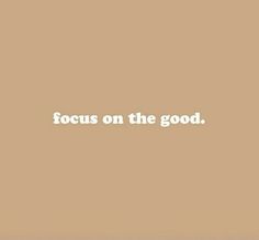 the words focus on the good are written in white letters against a tan background with a black and white border