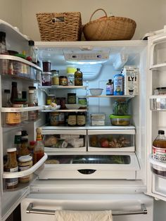 an open refrigerator filled with lots of food