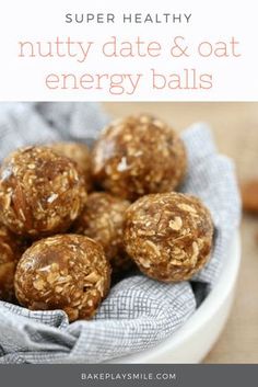 a bowl filled with energy balls on top of a table