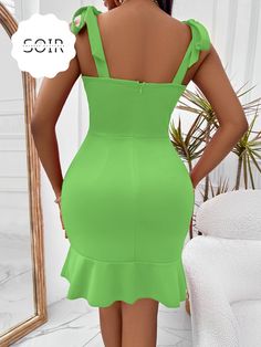 Dive into a vibrant romance with the Divine Dalliance Lime Green Tie-Shoulder Sweetheart Neck Ruffled Dress. Echoing the lively spirit of spring meadows and tropical paradises, this dress encapsulates the essence of playful elegance and spirited sophistication. Features: Material Composition: Fashioned from 100% pure crepe chiffon, the dress offers a dreamy translucence, ensuring a delicate touch against the skin while presenting a flowing silhouette. Tie-Shoulder Design: Adjustable tie-straps p Stretch Dresses Designs, Green Dress With Ruffles And Sweetheart Neckline, Flirty Green Dress With Ruffled Straps, Green Mini Dress With Sweetheart Neckline And Ruffles, Green Square Neck Flirty Dress, Green Dresses With Ruffled Straps For Spring, Spring Green Dresses With Ruffled Straps, Green Sweetheart Neckline Dress For Brunch, Green Spring Dresses With Ruffled Straps