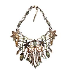 "Huge Statement Floral Bib Necklace (A2358) Size: About 16\" and 3\" drop. Color: Multicolor Condition: Very good vintage probably Era: Probably from the early 2000 Signed: None Please look at all the photos, as they are part of the description. I try my best to point out any flaws. Also please remember this is a preloved piece and may show signs of light wear, marks, scratches, etc. I will be posting a lot more jewelry, Keep checking back." Vintage Beaded Antique Gold Necklace, Antique Gold Beaded Vintage Necklace, Vintage Beaded Metal Chain Necklace, Bohemian Vintage Charm Jewelry For Party, Bohemian Style Party Jewelry With Vintage Charm, Vintage Green Jeweled Necklaces, Vintage Green Jeweled Necklace, Bohemian Jeweled Dangle Necklaces, Ornate Dangle Metal Necklaces