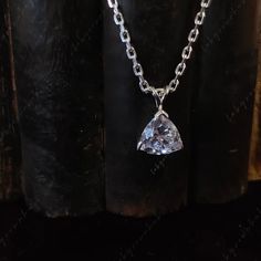 ● Free Engraving →It's a Free of Charge service, Which could be done after customer requests.  "Custom Order Always Welcome" <> STONE DETAILS Gem Type: Moissanite All Stone: Moissanite Stone Shape: Trillion Cut Stone Color: D Stone Weight: 1.20 CTW (Approx.) Elevate your style with our exquisite Trillion Cut Moissanite Pendant. This Solitaire Pendant showcases a stunning 1.5Ct Trillion Cut Moissanite, elegantly suspended from a 925 White Sterling Silver chain. Crafted to perfection, this necklac Sterling Silver Wedding Necklaces With Tension Setting, Wedding Necklaces In Sterling Silver With Tension Setting, Wedding Sterling Silver Necklaces With Tension Setting, Round Cut Diamond White Solitaire Necklace, Gift Cubic Zirconia Diamond Necklace In Tension Setting, Diamond White Jewelry With Trillion Brilliant Cut, Trillion Cut Moissanite Jewelry In Diamond White, Trillion Cut Solitaire Sterling Silver Jewelry, Trillion Cut Jewelry With Prong Setting As Gift