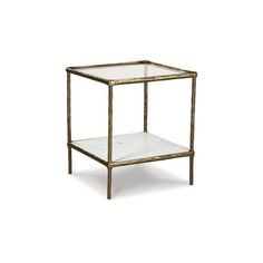 a glass and metal side table with a shelf underneath it on an isolated white background