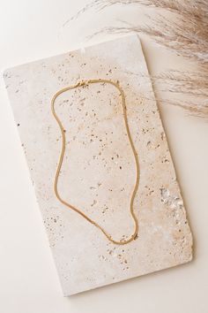 Named Herra after the Greek Queen of the Gods, Hera, this Herringbone chain is the perfect thing to wear everyday! 14K gold fill 18" chain length 2.4mm bold thickness Handmade in Eau Claire, WI by Hello Adorn Dainty Gold Herringbone Necklace With Delicate Chain, Everyday Gold Herringbone Necklace In 14k, Everyday 14k Gold Herringbone Necklace, Gold Herringbone Necklace With Box Chain, Gold Herringbone Necklace With Box Chain For Everyday, Gold Herringbone Necklace With Adjustable Chain For Everyday, Dainty Yellow Gold Herringbone Necklace With Box Chain, Dainty Yellow Gold Tarnish-resistant Herringbone Necklace, Yellow Gold Delicate Snake Chain Necklace For Everyday