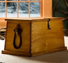 a wooden box sitting on top of a table