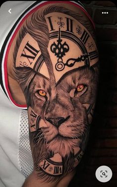 a man's arm with a clock and lion tattoo on it, in front of a brick wall