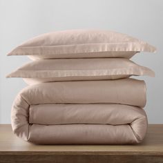 four pillows stacked on top of each other