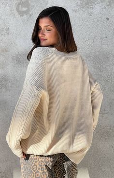 Cream Oversized Sweater

How to Style:
Stay cozy and warm in our cream oversized sweater (). Style it with leggings or jeans () and ankle boots () for a comfy yet stylish look perfect for a relaxed day or a sunset picnic!

Features:


  
 * Chunky knit fabrication 
 * Crew neckline 
 * Full length 
 * Cable knit design on the side and sleeves 
 * Oversized fit 
 * Long sleeve style 
 * Unlined 
 * Heavy weight material 
 * Slight stretch 
 * Pull on style Cream Oversized Sweater, Sunset Picnic, Oversized Cream Sweater, Prom Midi Dress, Summer Playsuit, Sweater Style, Sweater Crop, Strapless Tops, Crop Top Sweater