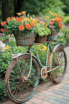 an old bicycle with baskets full of flowers