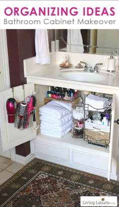 the bathroom cabinet is organized with towels and other things to keep in it's place