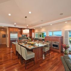 a large open concept kitchen and dining room