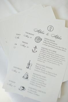 three wedding programs are sitting on top of each other