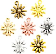 six different colors of metal flower charms