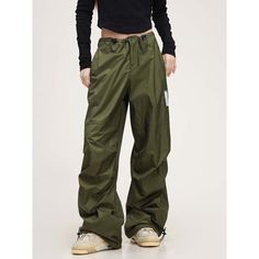 N-133-22 Green Drawstring Bottoms For Streetwear, Baggy Military Parachute Trousers, Baggy Military Style Parachute Pants, Military Style Wide Leg Bottoms For Outdoor, Green Techwear Wide Leg Bottoms, Green Wide Leg Techwear Bottoms, Green Wide-leg Techwear Bottoms, Outdoor Combat Wide Leg Bottoms, Combat Style Baggy Parachute Pants