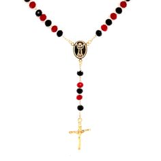 Wear the spiritual elegance of our Rosary Necklace with a beautiful Crucifix Pendant and Red-Black Crystal Beads, and experience the protective aura it brings. Crafted with 14k gold-filled chain, 18-inch long + 4-inch extension with crucifix pendant, this necklace is more than just a fashion statement – it's a symbol of faith and good fortune. Spiritual Protection: The combination of the Crucifix and Red and Black Crystal Beads on this rosary necklace symbolizes Strength, Courage, and Protection Red Spiritual Jewelry With Black Beads, Spiritual Red Jewelry With Black Beads, Spiritual Red Jewelry With Faceted Beads, Spiritual Protection, Rosary Necklace, Beautiful Rose, Lucky Charm, Black Crystals, Black Beads