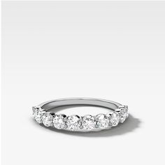 Each of the 11 ideal cut round diamonds in this ring shares two bead-head prongs with the stone beside it for maximum proximity and close-set sparkle. 2.9 mm band 0.88 carats total available in rose, yellow and white gold (select size and metal at checkout) Questions? Want to modify this ring? CONTACT US Nervous About Buying Jewelry Online? READ THIS Made in the USA. All sales are final. All Good Stone pieces are made to order – please allow 3-4 weeks for production, followed by 1-2 days for shi Shared Prong Wedding Band, Buy Jewellery Online, Rose Yellow, Dream Ring, Gold Platinum, Buying Jewelry, Online Jewelry, Prong Setting, Wedding Band