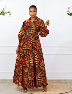 Beautiful African print Ankara Maxi dress. Long Bubble sleeves with a cuff at the wrist. Buttoned down to hemline. Flared cut from waist to hemline. Functional side pockets. Beautiful bold and colorful prints make you stand out wherever you go. Made with High quality 100% African Wax cotton Unlined Made in Nigeria Models are 5'9 and wearing a US6/UK10 and US12/UK16 Dress Length 60" CARE INSTRUCTIONS: Hand wash cold, DO NOT BLEACH, Hang dry, Press with cool iron on the wrong side only. Long African Print Dresses Ankara, Latest Ankara Dress Designs, Ankara Midi Dress, Latest Ankara Dresses, Layered Hem Dress, African Maxi Dress Ankara, Ankara Maxi Dress, Ankara Styles For Women, Ankara Dress Designs