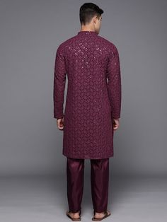 Burgundy embroidered Kurta with TrousersKurta design:Ethnic motifs embroideredStraight shapeRegular styleMandarin collar, long regular sleeves2 pockets chikankari detailKnee length with straight hemGeorgette machine weave fabricTrousers design:Solid TrousersPartially elasticated waistbandHook and eye closure Winter Floral Embroidery Long Sleeve Sets, Winter Floral Embroidered Long Sleeve Sets, Festive Long Sleeve Floral Bandhgala, Winter Kurta With Intricate Embroidery, Winter Bandhgala With Floral Embroidery And Long Sleeves, Winter Floral Embroidered Long Sleeve Bandhgala, Designer Winter Kurta With Floral Embroidery, Bollywood Style Embroidered Long Sleeve Sets, Floral Embroidered Long Sleeve Sets For Festivals