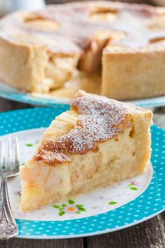 a slice of apple pie on a plate with a fork