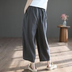 Details: Gender: Women Item Type: Pants Material: Linen Season: Spring, Autumn Pattern: Solid Style: Casual, Loose, Retro Waist Type: Elastic Waist Size: One Size Waist: 74.00 - 104.00 cm/ 29.13 - 40.94 " Length: 87.00 cm/ 34.25 " Hip: 134.00 cm/ 52.76 " Thigh: 82.00 cm/ 32.28 " Gray Wide Leg Pants For Spring, Casual Non-stretch High Waist Capris, Casual High Waist Non-stretch Capris, Non-stretch Cotton Capris With Pockets, Gray Relaxed Fit Bottoms For Spring, Casual Wide-leg Pants For Spring, Relaxed Fit Gray Bottoms For Spring, Casual High Waist Capris For Fall, Baggy Ankle-length Casual Capris