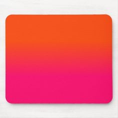 a bright pink and orange mouse pad