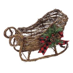 a wooden sleigh decorated with christmas decorations