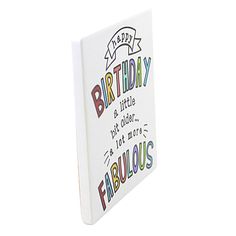 a white birthday card with the words fabulous on it's front and bottom corner