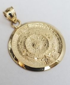 14k Real Yellow Gold Aztec sun calendar Pendant Charm | Etsy 14k Yellow Gold Sun Design Jewelry, 14k Yellow Gold Jewelry With Sun Design, Spiritual Yellow Gold Jewelry With Sun Design, Symbolic Gold Jewelry With Sun Design, Gold Jewelry With Sun Design In 14k Gold, Gold Jewelry With Sun Design, Gold Celestial Jewelry For Collectors, Sun Calendar, Aztec Sun