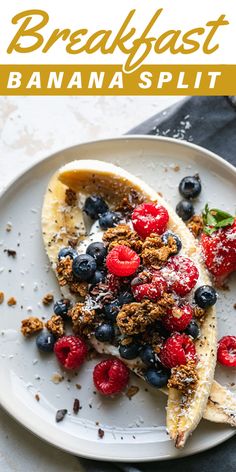 this breakfast is ready to be eaten and served on a white plate with strawberries