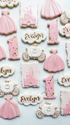 decorated cookies with princess theme for first birthdays and baby's first names on them