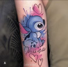 an arm tattoo with the words, mama and stitch in watercolors on it