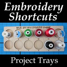 an image of embroidery shortcuts on a board with thread spools in it