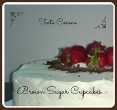 a white cake with strawberries on top and the words brown sugar cupcakes above it