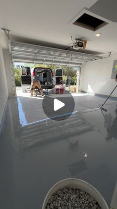 a man is working on the garage floor