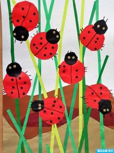 ladybugs on the grass made from paper