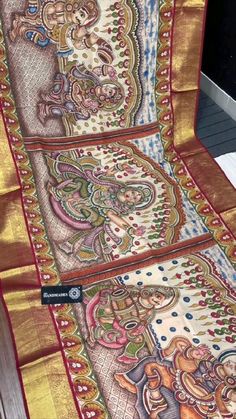 an intricately designed saree is on display