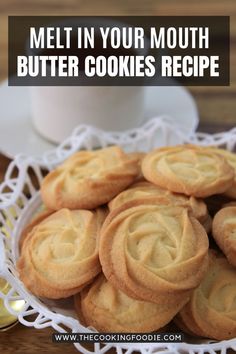 some cookies are in a white bowl on a table with the words melt in your mouth butter cookies recipe