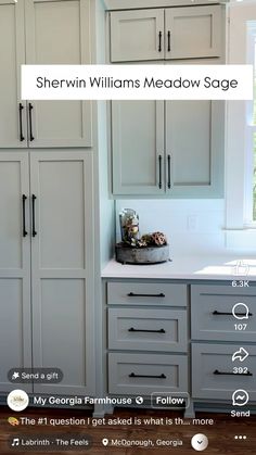 the kitchen cabinets are all white and have black handles on each drawer, which is labeled sherylin williams meadow sage