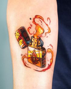 a person has a tattoo on their arm that is covered in red and yellow paint