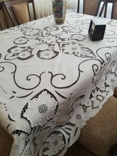 a table with a vase on top of it