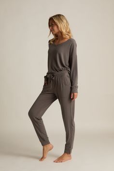 Our new Söft Collection starts with the softness of bamboo. Söft Lounge leggings and a tank with bralette have just enough stretch to hug you gently but let you be free. The entire collection is softer than soft. It’s Faceplant Söft. Söft joggers have non-binding elastic and drawstring waist for easy lounging. Scooped side pockets Side slits at cuffs fit comfortably over your ankles. Tight enough to look sleek but loose enough to feel cozy. Söft charcoal and Söft grey color selections flow beaut Versatile Relaxed Fit Yoga Pants For Lounging, Relaxed Stretch Activewear For Lounging, Comfy Activewear Long Pants For Lounging, Relaxed Loungewear Activewear Pants, Comfy Activewear For Lounging, Versatile Yoga Pants For Lounging, Relaxed Solid Color Activewear For Loungewear, Solid Color Comfortable Activewear For Loungewear, Comfortable Yoga Pants With Comfort Stretch For Lounging