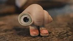 a close up of a toy with an eye on it