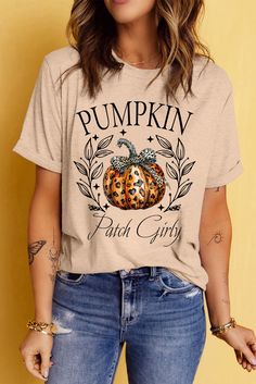 a woman wearing a t - shirt that says pumpkin patch girl