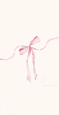 a pink ribbon is tied to a white wall