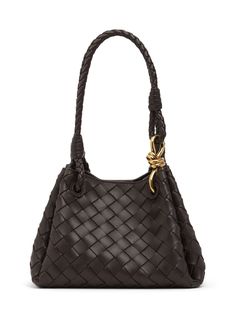 Find BOTTEGA VENETA Small Parachute Leather Bag on Editorialist. This small leather bag features an intrecciato weave design, a top handle, and a detachable shoulder strap. The bag has a brass finish hardware and an adjustable strap. The dimensions of the bag are 16.5 cm in height, 20 cm in width and 17 cm in depth. The bag has a handle drop of 20 cm and a strap drop of 55 cm. The bag is lined with bonded Intrecciato lambskin. Sea Salt Green, Padded Cassette Bag, Green Oasis, Small Leather Bag, New Bottega, Iconic Bags, Basket Bag, Pink Bag, Brass Finish