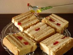 several slices of cake on a glass plate