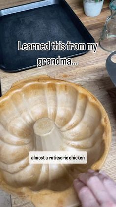 someone is placing something in a pan on top of the counter to make it look like they are baking