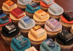 cupcakes with books on them sitting on top of each other