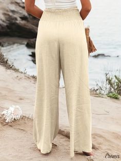 Eromis - Chic Solid Color Wide Leg Pants with Elastic Waistband for Women - Perfect for Spring & Summer Casual Wear Beige Bottoms With Elastic Waistband For The Beach, Beige Beach Bottoms With Elastic Waistband, Stretch Solid Color Pants For Beach, Beige Full-length Bottoms For Beach, Beige Full-length Bottoms For The Beach, Full-length Beige Bottoms For Beach, Beige Beach Pants With Loosely Fitted Hips, Solid Color Beach Pants With Elastic Waistband, Beach Season Pants With Elastic Waistband