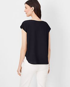 Embrace effortless elegance with the Ann Taylor Petite Boatneck Top, tailored specifically for a refined look. This top is perfect for those who appreciate a blend of comfort and style in their everyday wear.

- Size: Petite 2XS
- Color: Black
- Gender: Female
- Material: 100% Polyester
- Fit: Blousy - our most relaxed fit
- Length: 22 1/2" long
- Features: Boatneck, short sleeves, shirttail hem
- Care Instructions: Machine washable

Designed for the modern woman, this top features a classic boa Chic Tops For Layering With Relaxed Fit, Chic Relaxed Fit Tops For Layering, Relaxed Fit Crew Neck Top For Work, Casual Crew Neck Top In Viscose, Chic Viscose Crew Neck Top, Black Relaxed Fit Viscose Top, Casual Viscose Crew Neck Top, Casual Viscose Top For Fall, Elegant Crew Neck Top With Relaxed Fit